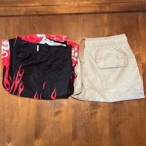 Bundle of 2 swim trunks. Adult small. Islander & Arizona